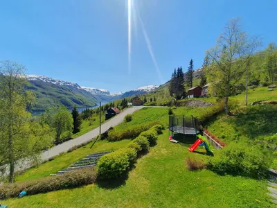 an overhead view of a field with a road at Leilighet i Røldal in Håra