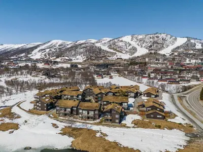 an aerial view of a resort in the snow at Beautiful City Cottage at Geilotunet in Hol