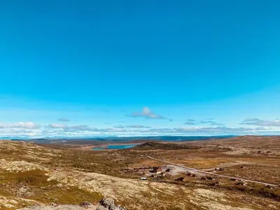 a view from the top of a mountain with a road at Mountain villa with amazing view of Hardangervidda! in Nørdstebø