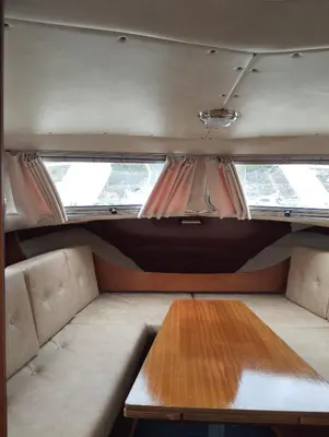 a coffee table in the back of a camper van at Flamingo in Vikedal
