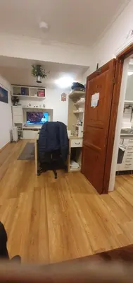 an office with a desk and a chair in a room at Stodio in Lii