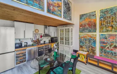 a kitchen with a glass table in a room at Nice Apartment In Bergen With Wifi in Bergen