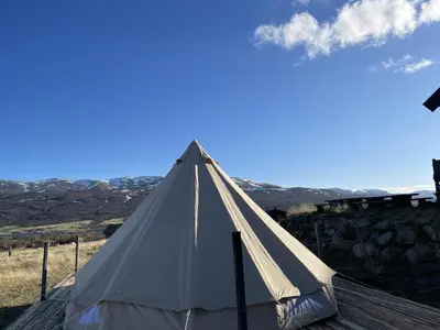 a teepee tent sitting on top of a roof at Syndinstøga in Ryfoss