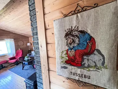 a tapestry hanging on a wall in a room at Holiday Home Tussebu by Interhome in Gripne