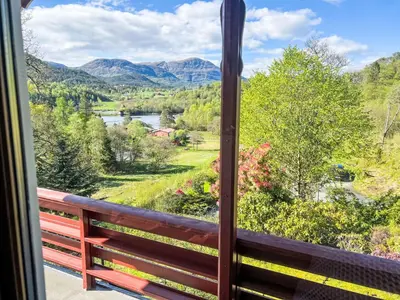 a view from a window of a river and mountains at Holiday Home Tussebu by Interhome in Gripne