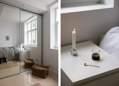 a room with a candle on a table and a bedroom at Sentral leilighet, Bergen in Bergen
