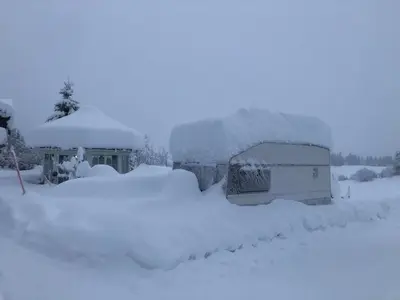 a house covered in snow with a yard at xxx in Ryfoss