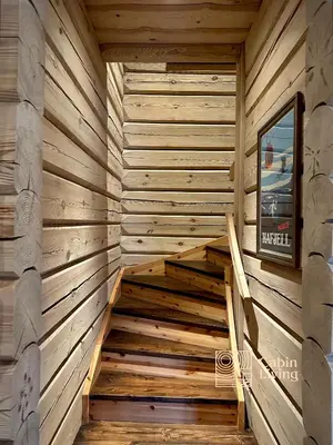 a wooden sauna with stairs in a cabin at Stylish log cabin in Hafjell with view & sauna in Hafjell