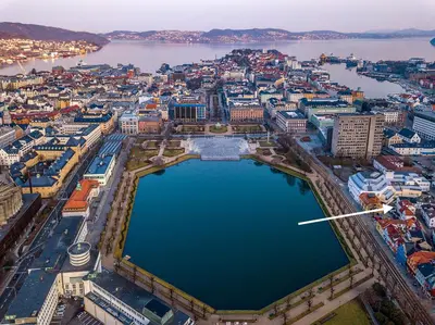 an aerial view of a city with a large body of water at Central apartment in Bergen City Center in Bergen