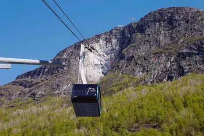 a ski lift in front of a mountain at Arnestova - villagehouse in Loen in Loen
