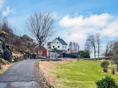 a house on the side of a road at 8 person holiday home in hauglandshella