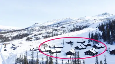 a group of houses on a snow covered mountain at Gaustatoppen Hytteutleie in Gaustablikk