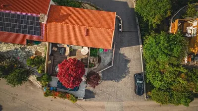 an overhead view of a building with red roofs at Lille Luxury moderne feriehus med stor uteplass, utekjøkken og pergola in Bergen