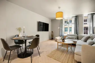 a living room with a couch and a table at Central apt in the centre of Bergen in Bergen