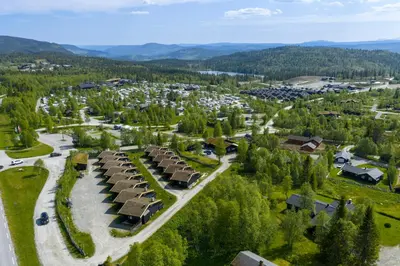 an aerial view of a resort in the mountains at Bitigrenda M in Beitostøl