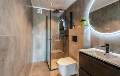 a bathroom with a shower and a toilet and a sink at Amazing Home In Ål - With Wifi in Ål
