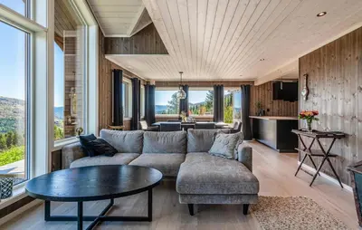 a living room with a couch and a table at Amazing Home In Ål - With Wifi in Ål