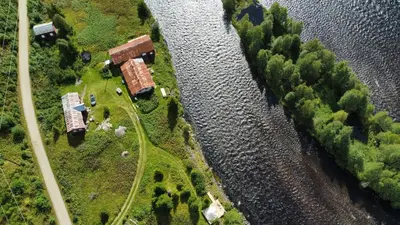 an aerial view of a river with a train yard at River Glamping - Jordet, Trysil in Trysil