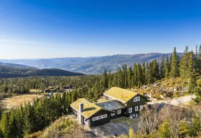 an aerial view of a house in the mountains at Family Cabin With Jacuzzi At Tempelseter in Eggedal
