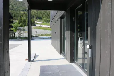 an empty building with a view of a parking lot at Stylish apartment in Hemsedal, Ski in-ski out in Hemsedal