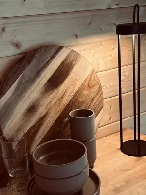 a table with two cups and a glass at Unique and romantic Lakeside Experience in Vossevangen