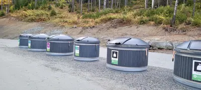 a row of trash cans lined up in a row at Luxury Mountain Cabin Modern and Stylish in Uppheim
