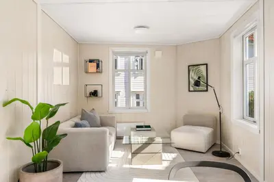 a living room with a couch and a table at Charming Townhouse - Walk Everywhere! in Bergen
