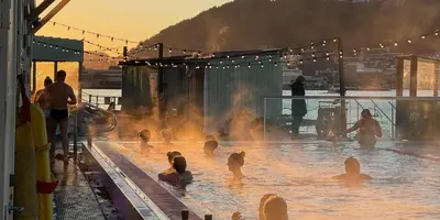 a group of people in a swimming pool at You cottage in the city in Bergen