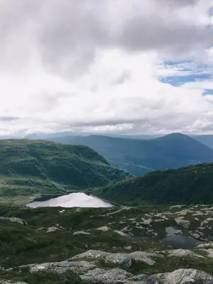 a view from the top of a mountain with a lake at Fjord view apartment in Vaksdal