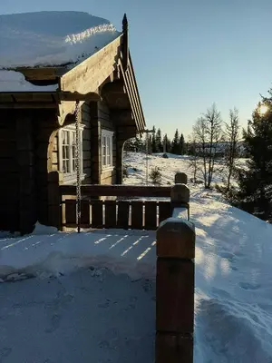 a log cabin in the snow with snow at Tømmerhytte Med Utsikt Over Jotunheimen in Gålå