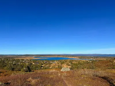 a view of a lake from the top of a hill at Magiske Vinterdage I Sjusjøen in Mesnali