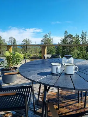 a blue table with two mugs on top of it at Modern Cabin At Blefjell in Svene