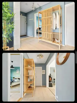 a living room and a room with a book shelf at Great Downtown Apartment in Lii