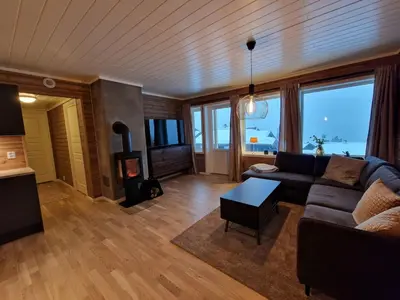 a living room with a couch and a fireplace at Apartment in Voss - Tråstølen in Skulestadmo