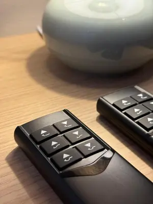a black computer keyboard sitting next to a white bowl at Geiloholtet central city apartment in Geilo