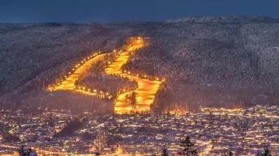an aerial view of a city at night at Beautiful apartment in the city center in Lii