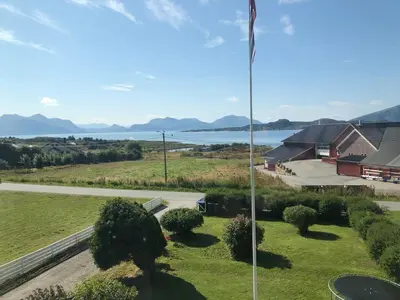 a view of the lake from the roof of a house at Two floors house with 3 bed rooms and room for 8 persons in Ålesund