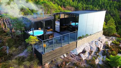 an aerial view of a house on a mountain at Speilhus med badestamp - en unik naturopplevelse in Solem