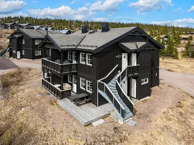 an overhead view of a black house with a staircase at Trysilfjell 786 by Vacation Trysil in Trysil