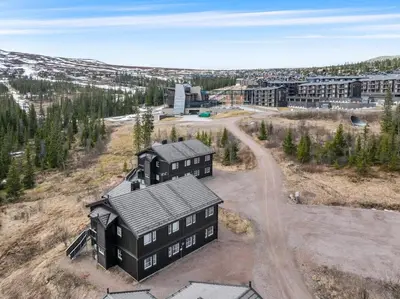 an aerial view of a house in a field at Trysilfjell 782 by Vacation Trysil in Trysil