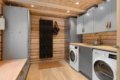 a laundry room with a washer and dryer at Trysilfjell 25 by Vacation Trysil in Trysil