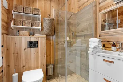 a bathroom with a shower and a toilet at Trysilfjell 25 by Vacation Trysil in Trysil