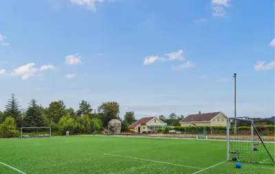 a soccer field with a soccer ball on it at 3 Bedroom Gorgeous Home In Kolbeinsvik in Kolbeinsvik