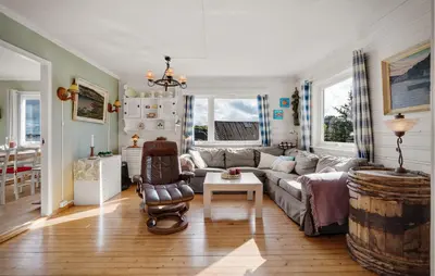 a living room with a couch and a chair at Amazing Home In Rong With Ethernet Internet in Rong