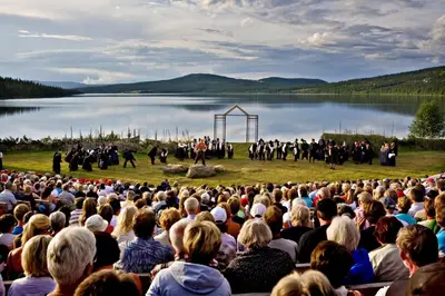 a large crowd of people watching a horse show at Cabin with ski in-out in Sør-Fron