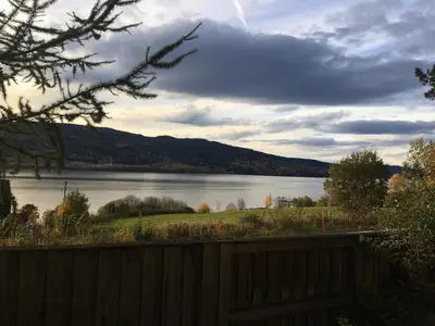 a view of a body of water with a wooden fence at Welcome to Dalborg, only 1,5 hours from Oslo