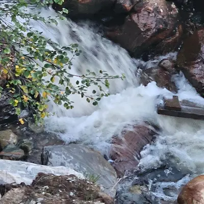 a waterfall with snow on the rocks at Flott hytte i Elgtrakket 9, 3864 Rauland Skisenter - Holtardalen in Torvetjørn