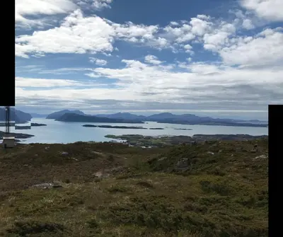 a view of a lake on top of a hill at West coast peace in Hyllestad