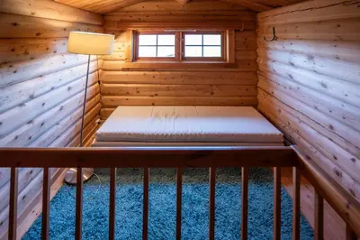 a sauna with a bench in a log cabin at Trysilfjellet Sør 480 in Trysil