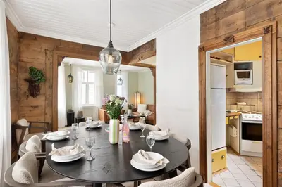 a dining room with a table and chairs at Historic Gem I Charming Bergen Home in Bergen